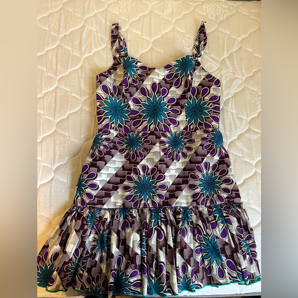 - This blue-green dress is made with a traditional African loincloth in si…